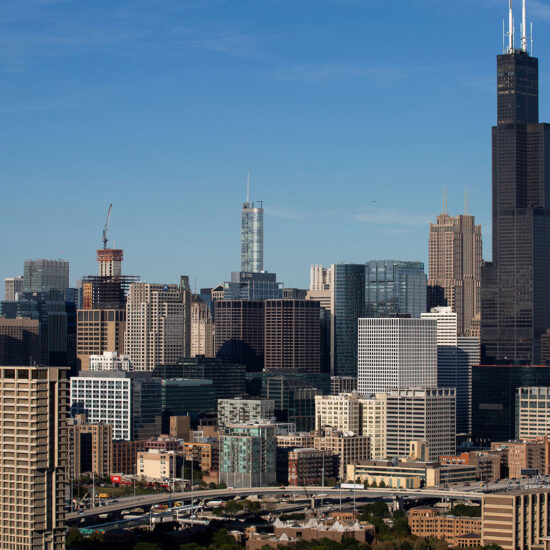 Chicago skyline with Willis Tower featured and the UIC logo in red